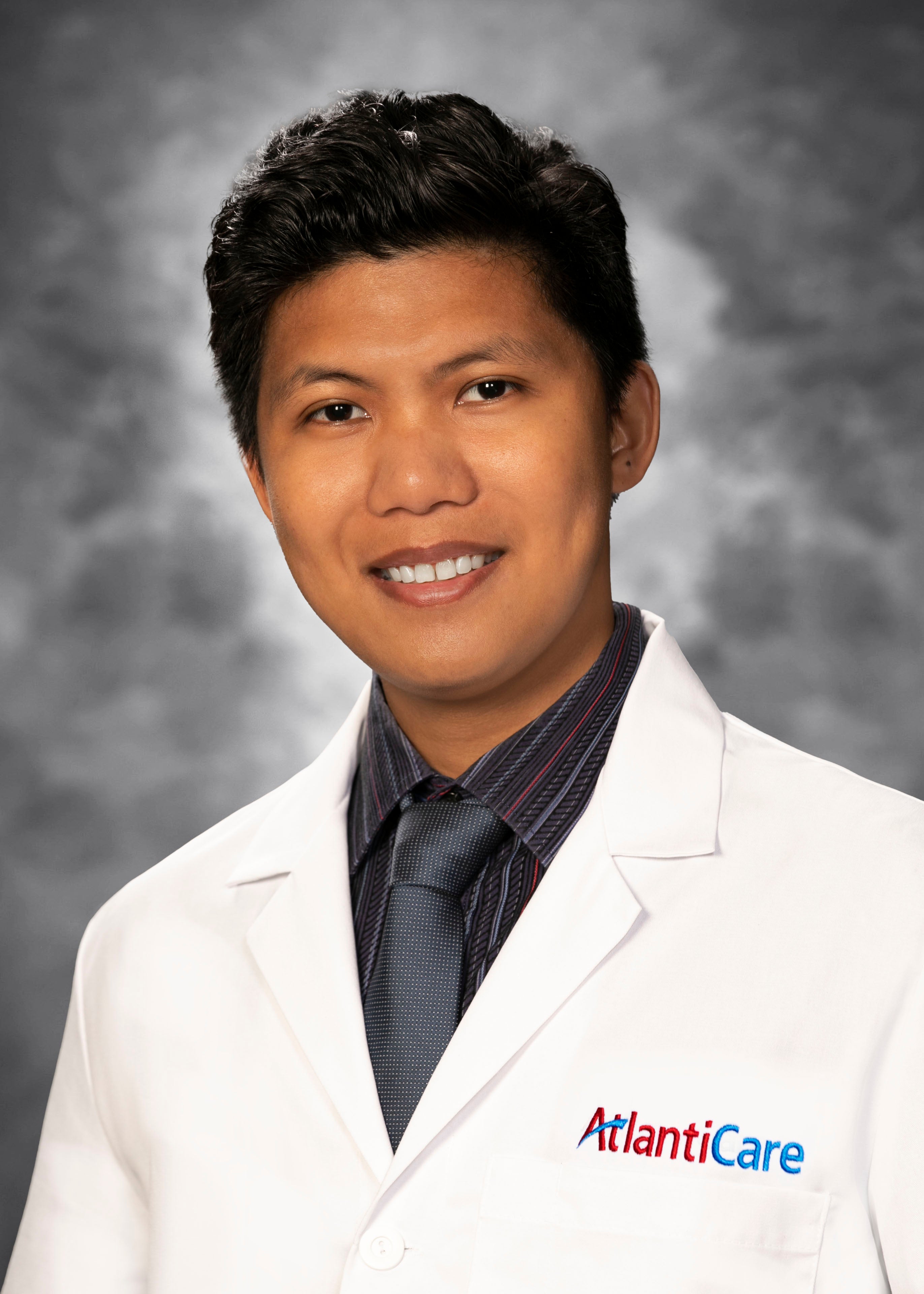 Von Patrick Dela Rosa, MD